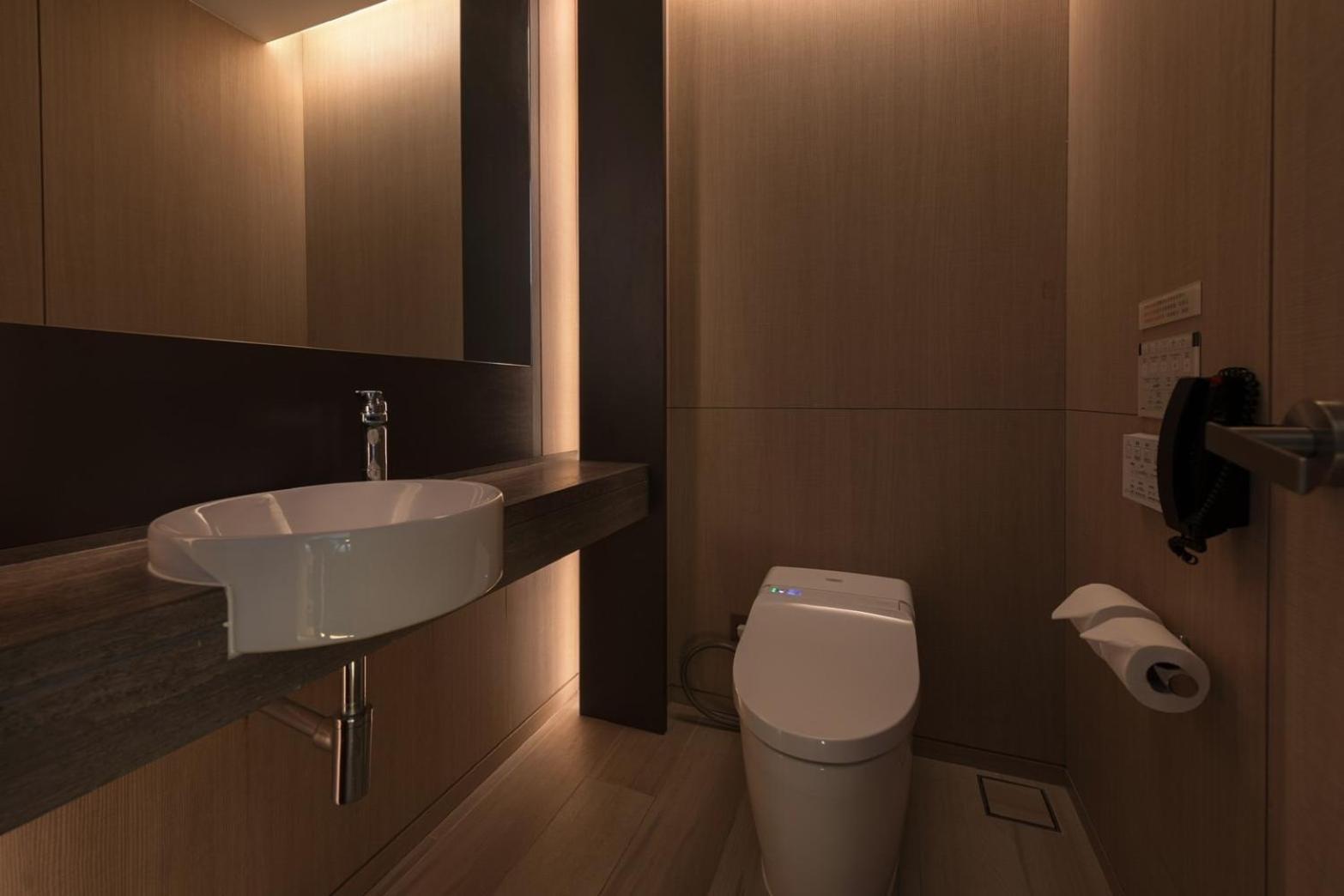 Mu 자오시 호텔 외부 사진 A modern bathroom