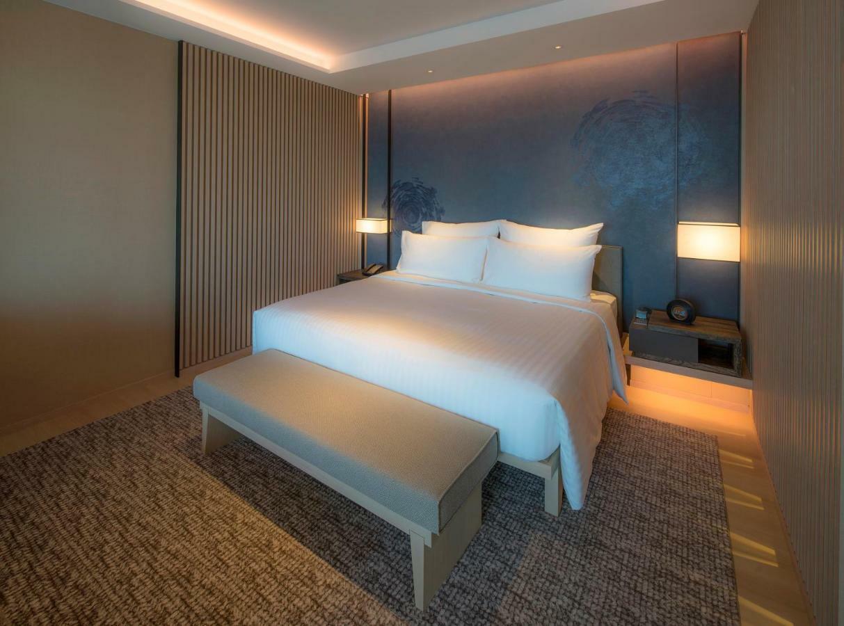 Mu 자오시 호텔 외부 사진 A bedroom at the hotel